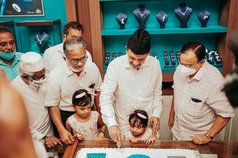 Cake cutting at the showroom opening